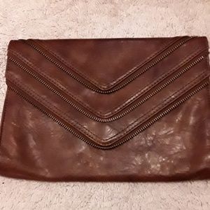 Brown leather clutch
